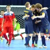 Australia đã vượt qua Kyrgyzstan (áo đỏ) để giành vé cuối cùng dự World Cup Futsal. (Nguồn: AFC)