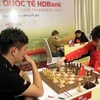 Trận đấu giữa kỳ thủ nữ số 1 Việt Nam Phạm Lê Thảo Nguyên và kỳ thủ Wang Hao (Trung Quốc). (Ảnh: Hoàng Hải/TTXVN)