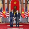 Chủ tịch nước Trần Đại Quang và Tổng thống Hoa Kỳ Barack Obama. (Ảnh: Nhan Sáng/TTXVN)