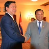 Bí thư Thành ủy Thành phố Hồ Chí Minh Đinh La Thăng làm việc tại Campuchia. (Ảnh: Trần Chí Hùng/Vietnam+)