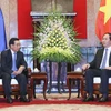Chủ tịch nước Trần Đại Quang tiếp Phó Chủ tịch nước Cộng hòa Dân chủ Nhân dân Lào. (Ảnh: Nhan Sáng/TTXVN)