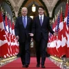 Phó Tổng thống Mỹ Joe Biden và Thủ tướng Canada Justin Trudeau. (Nguồn: AP)