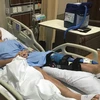 Đình Trọng đã phẫu thuật thành công chấn thương dây chằng tại Singapore chiều 25/6. (Nguồn: Hà Nội FC)