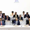 Thủ tướng Nguyễn Xuân Phúc dự Phiên thứ nhất về Kinh tế toàn cầu, Thương mại và Đầu tư. (Ảnh: Thống Nhất/TTXVN)