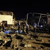 Hiện trường vụ tấn công nhằm vào một trung tâm dành cho người tị nạn ở gần thủ đô Tripoli, Lybia, ngày 3/7. (Ảnh: AFP/TTXVN)