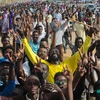 Người dân Sudan vui mừng sau khi của Hội đồng quân sự chuyển tiếp tại Sudan (TMC) và Liên minh tự do và thay đổi (FFC) đạt thỏa thuận. (Ảnh: THX/TTXVN)