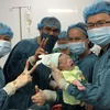 Hai mẹ con sản phụ được cứu sống hiện đang điều trị tại Bệnh viện Đa khoa tỉnh Quảng Trị. (Ảnh: Thanh Thủy/TTXVN)