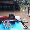 Nhiều nhà dân tại xã Nam Cát Tiên (huyện Tân Phú) ngập sâu trong nước lũ. (Ảnh: Sỹ Tuyên/TTXVN)