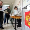 Cử tri Nga đi bỏ phiếu. (Nguồn: TASS)