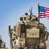 Xe quân sự Mỹ tại căn cứ liên quân ở ngoại ô thị trấn Ras al-Ain thuộc tỉnh Hasakeh, Đông Bắc Syria, giáp giới Thổ Nhĩ Kỳ. (Ảnh: AFP/TTXVN)