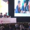 Phó Trưởng ban Tuyên giáo Trung ương Nguyễn Thanh Long (giữa) phát biểu tại hội thảo. (Ảnh: Lưu Việt Hùng/TTXVN)
