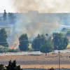 Khói bốc lên sau một cuộc tấn công tại Tal Abyad, Syria. (Ảnh: THX/ TTXVN)