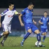 Văn Quyết (áo trắng) giúp Hà Nội FC vượt qua Quảng Nam để giành Cúp Quốc gia 2019. (Nguồn: Zing)