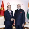 Thủ tướng Nguyễn Xuân Phúc gặp Thủ tướng Ấn Độ Narendra Modi. (Ảnh: Thống Nhất/TTXVN)