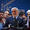Ứng viên Tổng thống Afghanistan Abdullah Abdullah (giữa). (Ảnh: AFP/TTXVN)