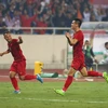 Tiến Linh (phải) ghi bàn mang chiến thắng về cho Việt Nam. (Ảnh: Nguyên An/Vietnam+)