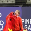 Hồng Thanh giành huy chương Vàng ở hạng cân 64kg môn Cử tạ. (Ảnh: Trần Giáp/Vietnam+)
