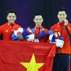 Nguyễn Việt Anh-Nguyễn Chế Thanh-Vương Hoài Ân giành HCV Aerobic. (Ảnh: Vietnam+)