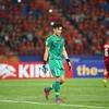 Bùi Tiến Dũng mắc sai lầm trong trận thua của U23 Việt Nam. (Ảnh: Vietnam+)