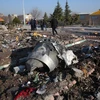 Hiện trường vụ máy bay của Hãng hàng không quốc tế Ukraine rơi tại Tehran, Iran. (Ảnh: AFP/TTXVN)
