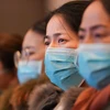 Nhân viên y tế thành phố Thượng Hải tới dự buổi tập huấn công tác đối phó với chủng virus corona mới, tại Vũ Hán, tỉnh Hồ Bắc, Trung Quốc. (Ảnh: THX/TTXVN)