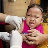 Một em bé được tiêm vắcxin tại Philippines hồi năm ngoái. (Nguồn: AFP)