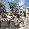 Hiện trường một vụ tấn công tại Somalia. (Ảnh: AFP/TTXVN)
