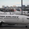 Japan Airlines (JAL) thông báo điều chỉnh giảm dự báo lợi nhuận ròng của hãng năm nay. (Nguồn: AFP)