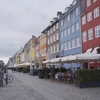 Các cửa hàng đóng cửa do ảnh hưởng của dịch COVID-19 tại Copenhagen, Đan Mạch ngày 17/3. (Ảnh: THX/TTXVN)