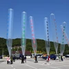 Các nhà hoạt động Hàn Quốc thả truyền đơn tại khu vực biên giới với Triều Tiên. (Nguồn: ibtimes.co.uk)