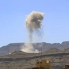 Khói bốc lên sau một vụ không kích tại Sanaa, Yemen, ngày 23/2. (Ảnh: AFP/TTXVN)