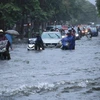 Mưa lớn gây ngập lụt cục bộ tại một số nơi tại Hải Phòng. (Ảnh: Hoàng Ngọc/TTXVN)