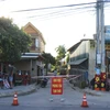 Một khu dân cư ở Khu phố 2, phường Đông Giang, thành phố Đông Hà bị phong tỏa. (Ảnh: Nguyên Lý/TTXVN)