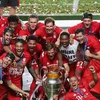 Niềm vui phút đăng quang vô địch UEFA Champions League của các cầu thủ Bayern Munich. (Ảnh: AFP/TTXVN)