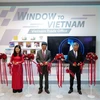 Cắt băng khánh thành dự án Window to Vietnam. (Ảnh: Hữu Kiên/TTXVN)