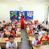 Tiết học đầu tiên của lớp 1C trường Tiểu học Trung Yên (quận Cầu Giấy). (Ảnh: Huy Hùng/TTXVN)