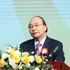 Thủ tướng Nguyễn Xuân Phúc, Chủ tịch Hội đồng Thi đua-Khen thưởng Trung ương phát biểu. (Ảnh: Thống Nhất/TTXVN)