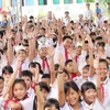 Học sinh ở Nghệ An hưởng ứng 'Ngày Quốc tế trẻ em gái.' (Ảnh: Nguyễn Oanh/TTXVN)