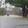Nhiều tuyến đường tại thành phố Huế bị ngập từ 0,3-1m. (Ảnh: Tường Vi/TTXVN)
