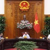 Thủ tướng Nguyễn Xuân Phúc chủ trì cuộc họp về công tác chuẩn bị cho Hội nghị Cấp cao ASEAN lần thứ 37 và các hội nghị cấp cao liên quan. (Ảnh: Thống Nhất/TTXVN)