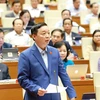 Bộ trưởng Bộ Tài nguyên và Môi trường Trần Hồng Hà giải trình làm rõ ý kiến đại biểu Quốc hội. (Ảnh: Phương Hoa - TTXVN)