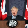 Thủ tướng Anh Boris Johnson xác nhận thỏa thuận thương mại với EU đã hoàn tất. (Ảnh: AFP/TTXVN)