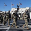 Lực lượng vệ binh quốc gia Mỹ tuần tra gần Đồi Capitol ở Washington, D.C. (Ảnh: AFP/ TTXVN)