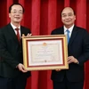 Chủ tịch nước trao tặng Huân chương cho nguyên lãnh đạo Bộ Xây dựng