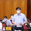 Bộ trưởng Bộ Y tế Nguyễn Thanh Long báo cáo tình hình và diễn biến dịch bệnh COVID-19. (Ảnh: Dương Giang/TTXVN)