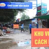 Chợ Xanh Văn Quán (quận Hà Đông) tạm thời bị phong tỏa. (Ảnh: Phan Tuấn Anh/TTXVN)