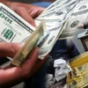 Cuba: Dừng tiếp nhận tiền gửi ngân hàng bằng USD từ 21/6