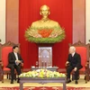 Tổng Bí thư Nguyễn Phú Trọng tiếp Thủ tướng Lào Thongloun Sisoulith, hồi tháng 12/2020. (Ảnh: Trí Dũng/TTXVN)