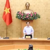 Thủ tướng Phạm Minh Chính chủ trì họp trực tuyến Chính phủ với 27 tỉnh, thành phố phía Nam để triển khai các biện pháp cấp bách nhằm ngăn chặn, kiểm soát dịch COVID-19. (Ảnh: Dương Giang/TTXVN)
