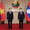 Bộ trưởng Bộ Ngoại giao làm việc với Bộ trưởng Ngoại giao Lào